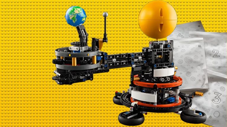 Lego Planet Earth and Moon in Orbit 42179 set, with paper bags in the background.